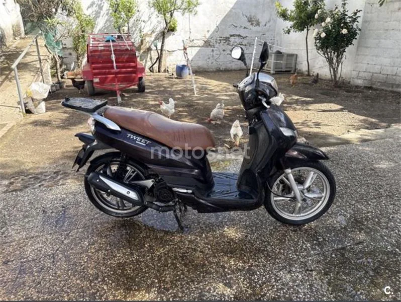 Peugeot Tweet 125 1100 € 2010 Sevilla - 1