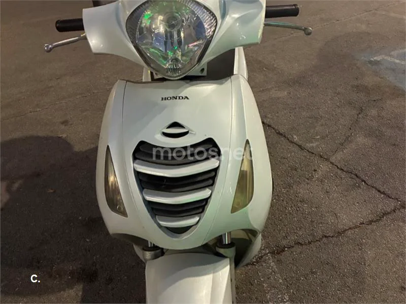 Honda Pasión 125 - Vista 1
